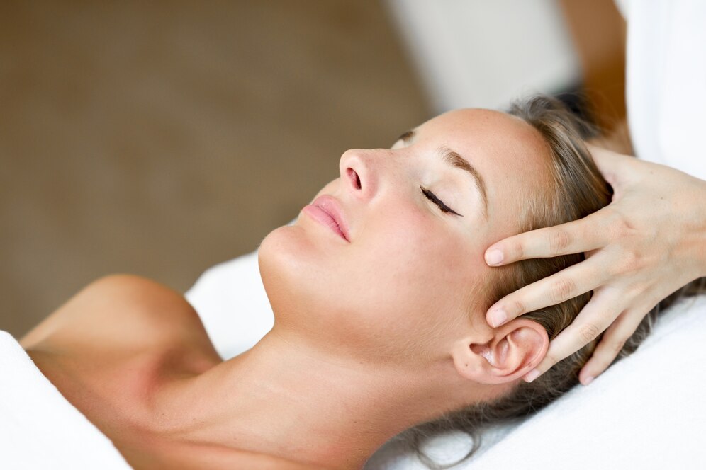 young-woman-receiving-head-massage-spa-center_1139-1132.jpg